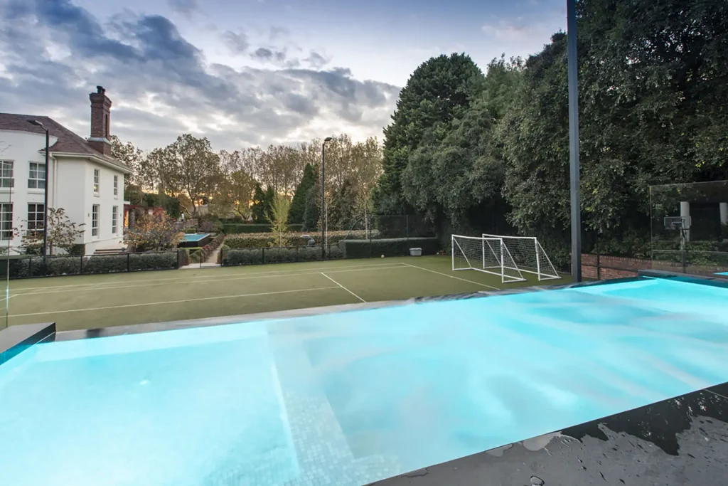 Luxury backyard with pool and court
